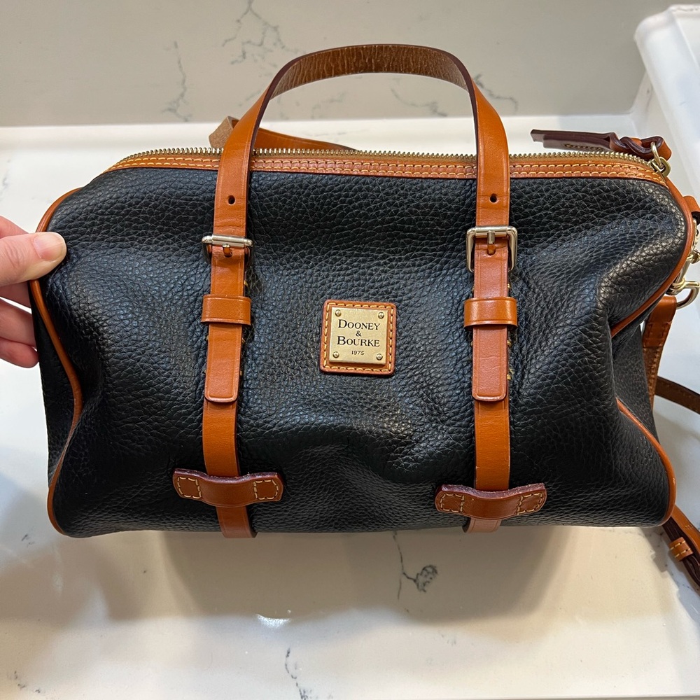 Like new black and brown Dooney and Bourke purse.